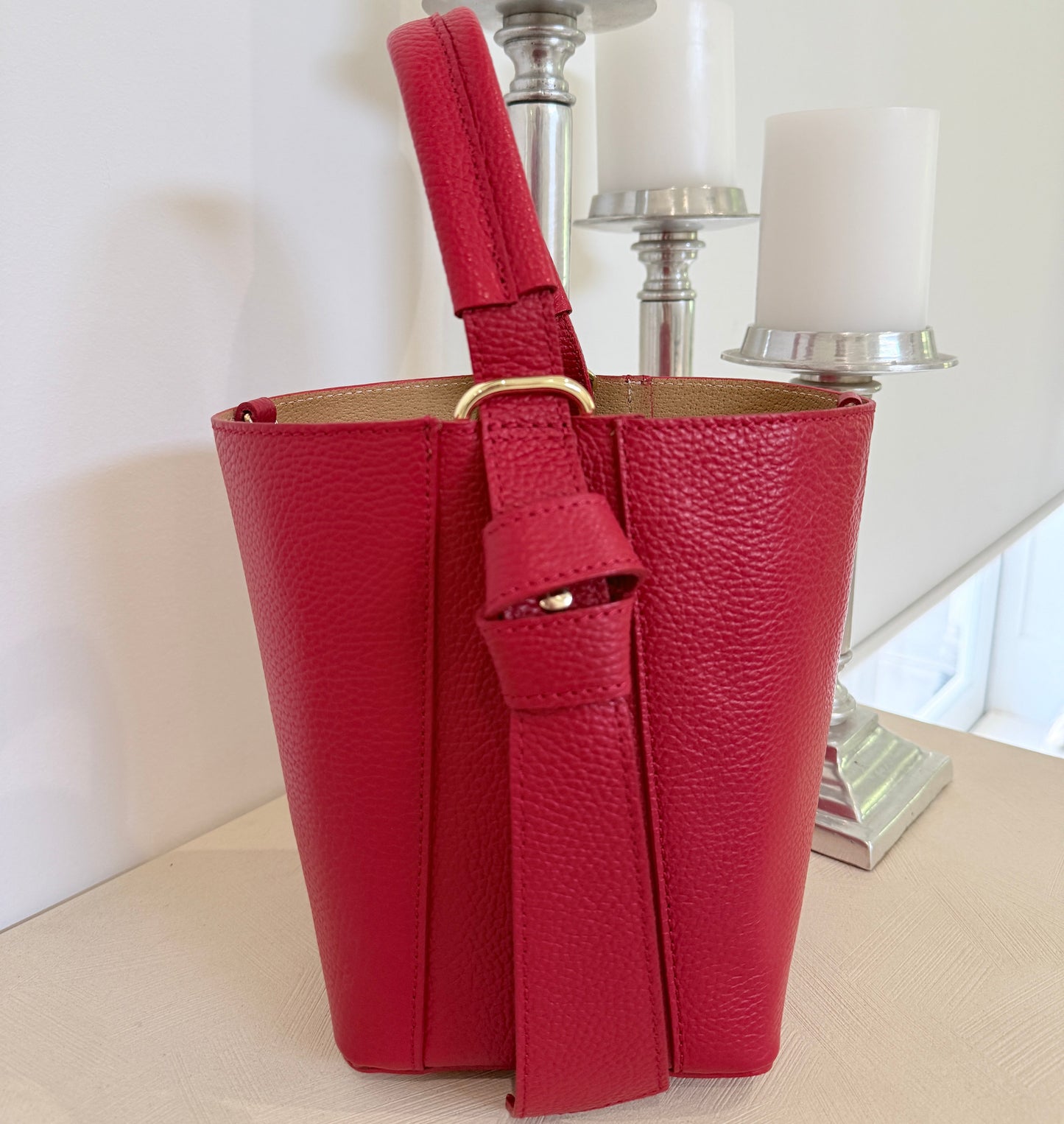 Raspberry Red ❤️
Italian leather with gold hardware.